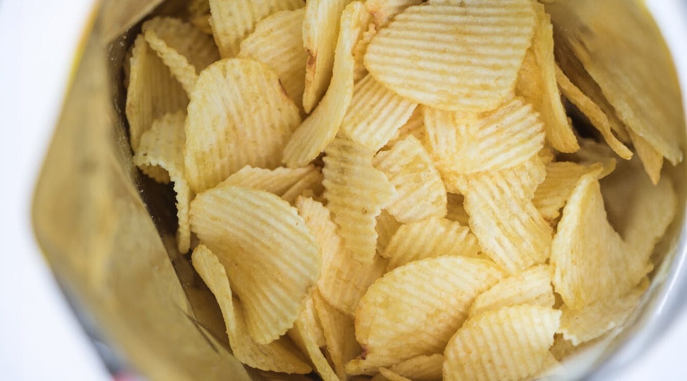 A bag of opened potato chips.
