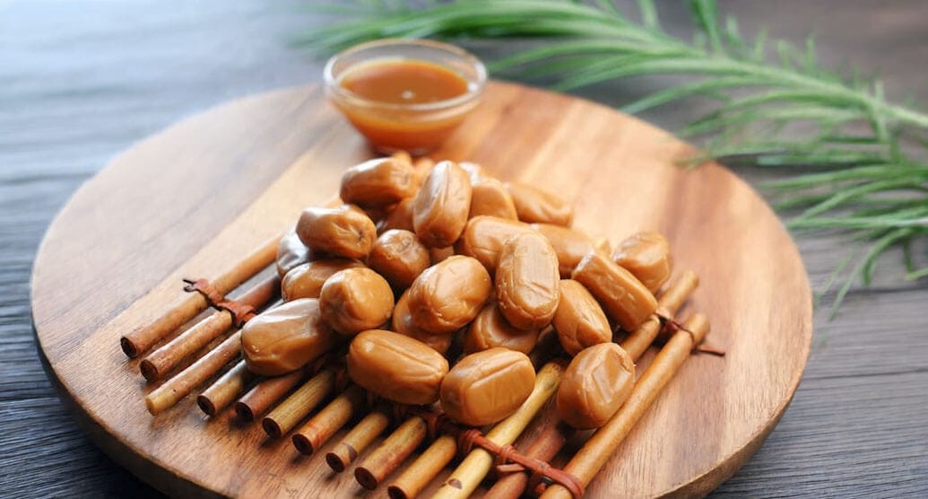 Individual caramels in a pile