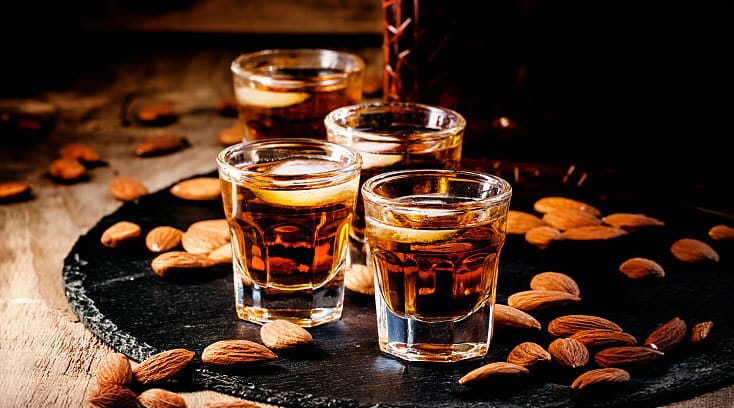 Amaretto shots being poured