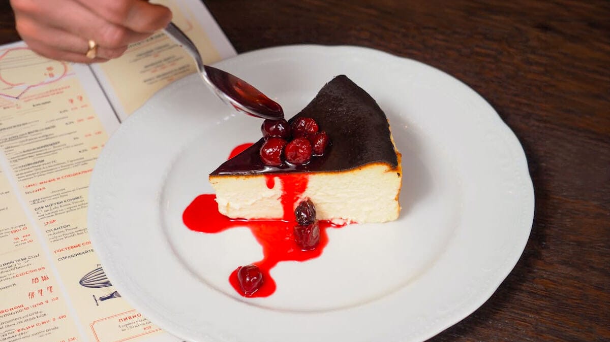 a slice of cherry cheesecake