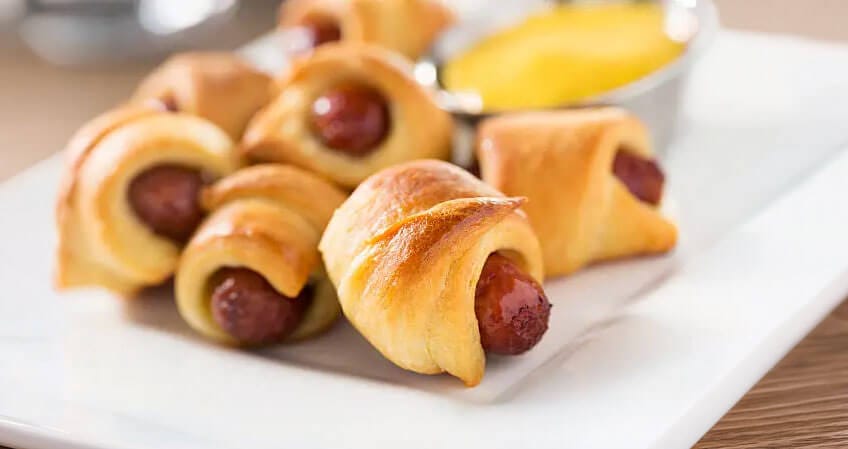 A few pigs in a blanket snack